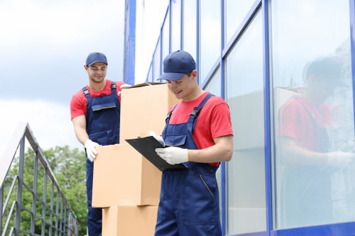 Man with van removal service helping with house move in Peckham