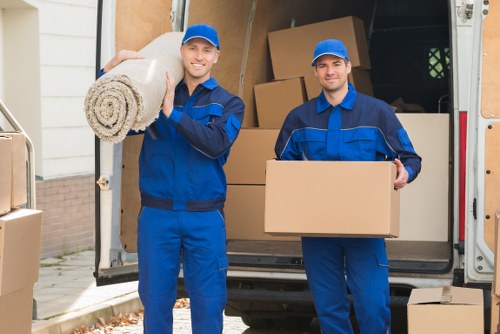 Removal team planning a home move in Peckham on a residential street