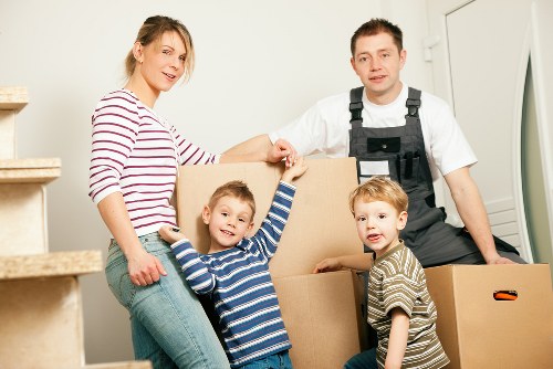 Removal van prepared for a move in a Peckham residential street