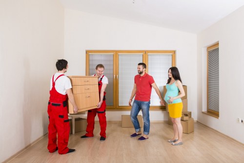 Removal van loading household items for a South London move