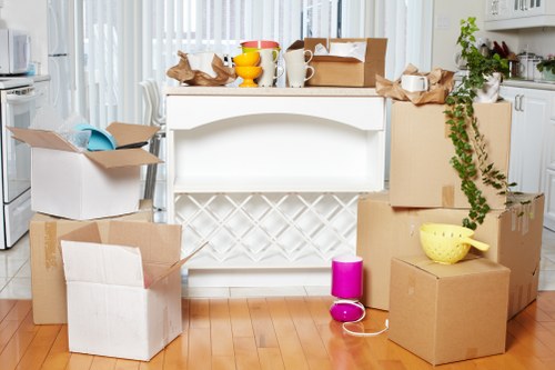 Packed boxes and furniture ready for local removals