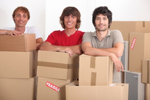 Loading household items into a removal van for a South London move