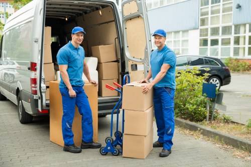 Packed boxes and furniture loaded for transport in South London