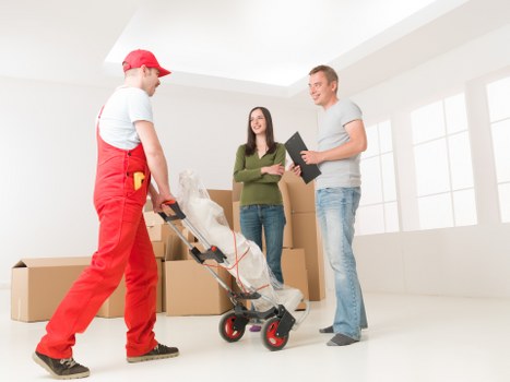 Careful loading of household items for a Peckham relocation