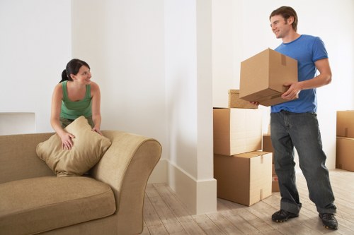 Commercial moving team loading office items for a Peckham business